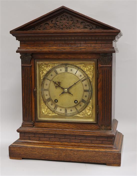 A W & H oak mantel clock, ting tang striking, height 41cm